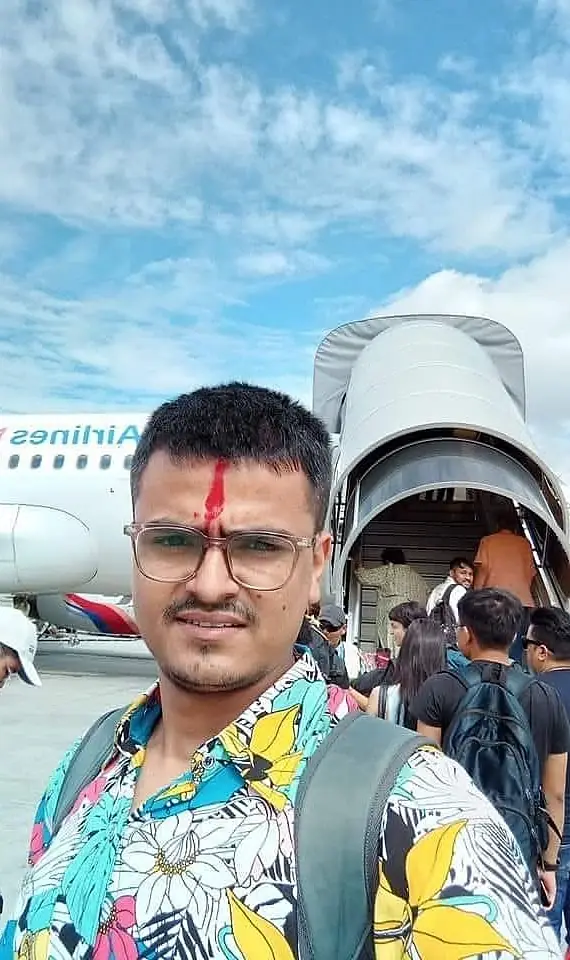 Hemraj taking a selfie before boarding a flight